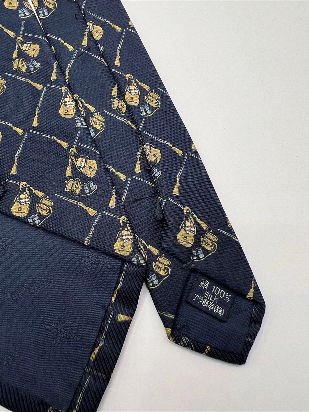 502. Burberrys Navy Tie with Gold Crest Pattern